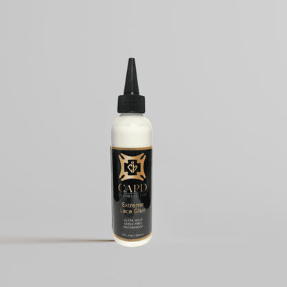 A bottle PowerHold™ Wig Glue – 5 oz of lace wig glue with a black cap and black label, marked with the brand name CAPD INSPIRED HAIR.